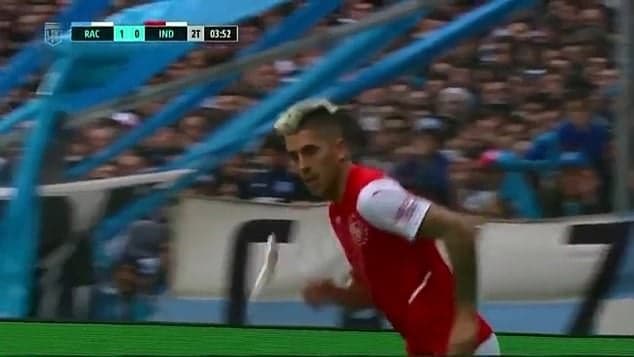 Leandro Fernandez hit in face by fish thrown from the crowd and carried off on a stretcher