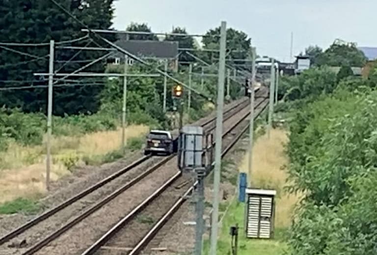 Man filmed driving along railway to escape cops found guilty of endangering life Man filmed driving along railway to escape cops found guilty of endangering life