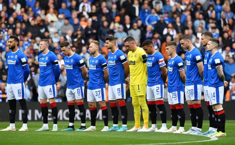 Dundee United fans sing ‘Lizzie’s in a box’ during minute’s silence at Ibrox Dundee United fans sing ‘Lizzie’s in a box’ during minute’s silence at Ibrox