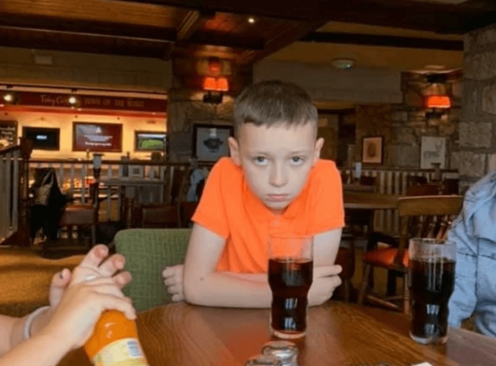 Camera-shy boy couldn’t be more against having his school photo taken