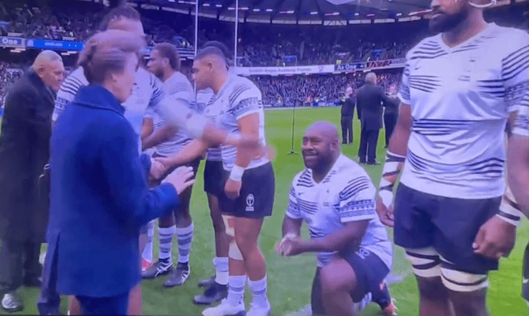 Fiji rugby players respectfully kneel for Princess Anne before Scotland match Fiji rugby players respectfully kneel for Princess Anne before Scotland match