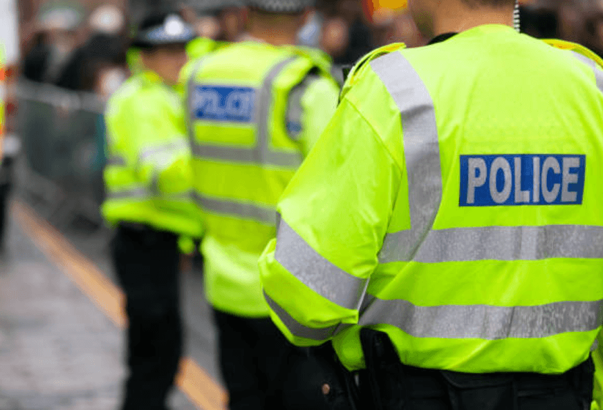 Two retired Met Police officers charged over child sex abuse images