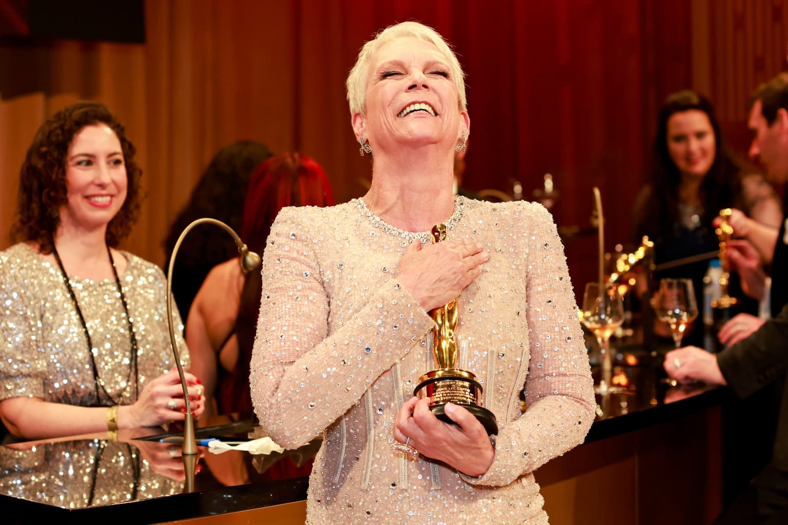 Jamie Lee Curtis talks about degendering Oscar categories as she wins first-ever Academy Award