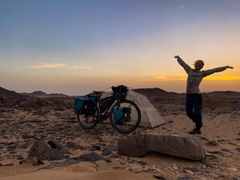 Adventurer says getting caught up in Sudanese civil war won’t derail her dream of cycling the world