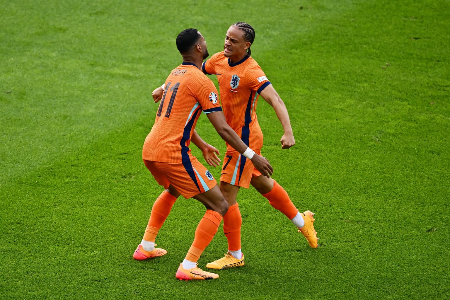 Why do the Netherlands play in orange despite the colour not featuring on their flag?