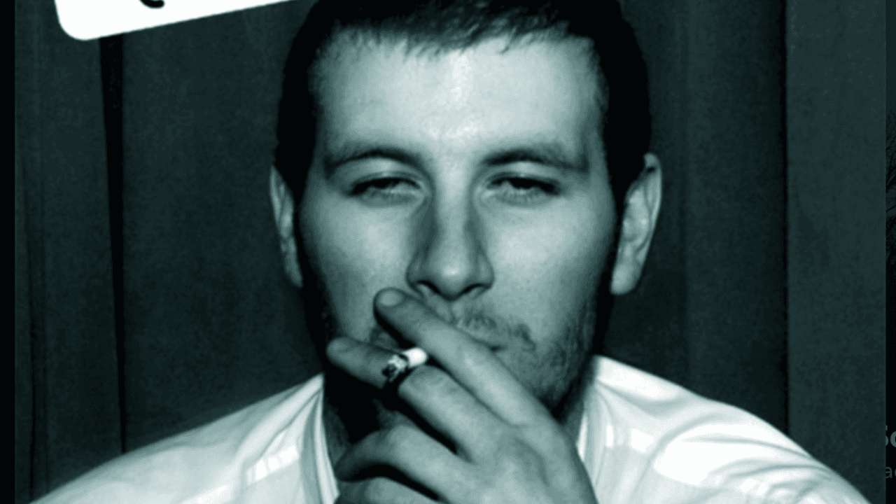 Man on Arctic Monkeys album cover reveals crazy story behind iconic shot