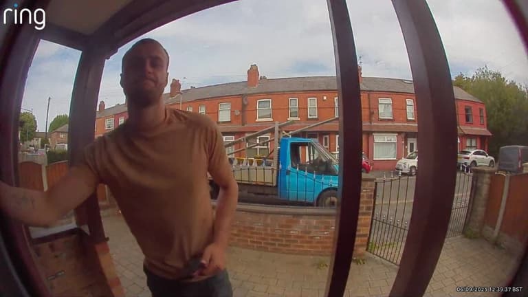 Homeowner left baffled as mystery builders cover house in scaffolding