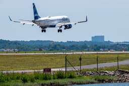 Plane carrying over 100 people collides with drone while landing