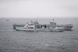 Jets scrambled to intercept Russian plane ‘dropping devices’ near UK flagship carrier