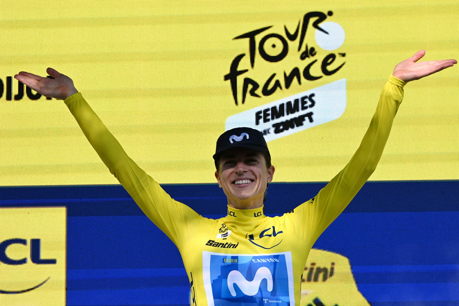 Reusser wins time trial to take tour lead