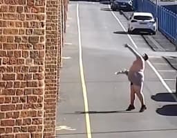 Man’s terrible attempts to throw drugs into jail captured on CCTV in viral clip