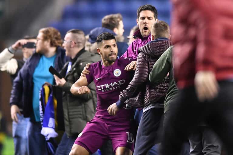 There was a sinister reason Sergio Aguero lashed out at a Wigan fan last night There was a sinister reason Sergio Aguero lashed out at a Wigan fan last night