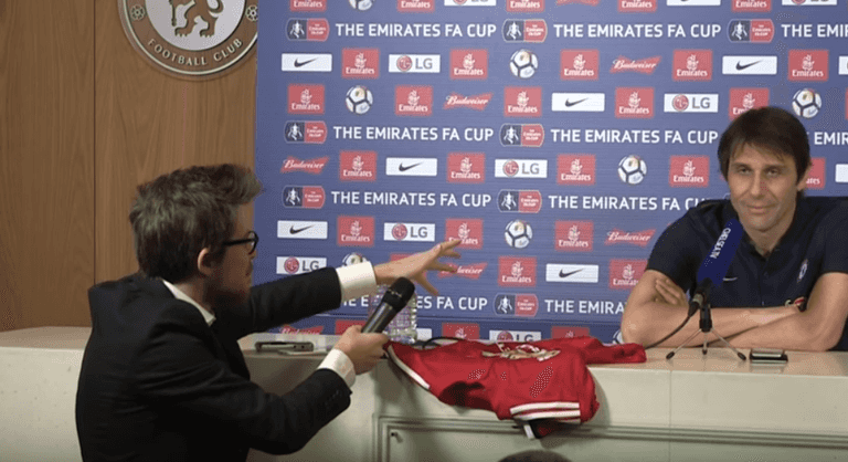 WATCH: Antonio Conte shows the restraint of a saint after being handed signed Man Utd jersey by “journalist” WATCH: Antonio Conte shows the restraint of a saint after being handed signed Man Utd jersey by “journalist”