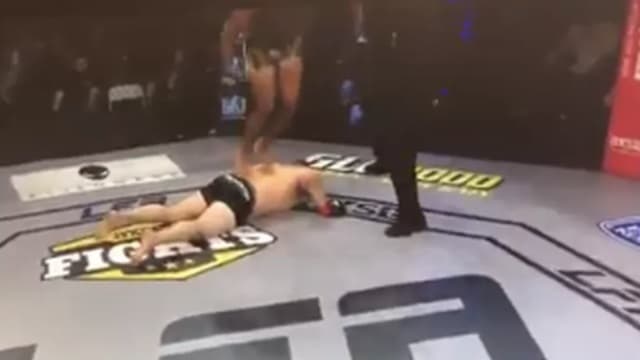 Unsporting front flip on to semi-conscious opponent gets fighter disqualified Unsporting front flip on to semi-conscious opponent gets fighter disqualified