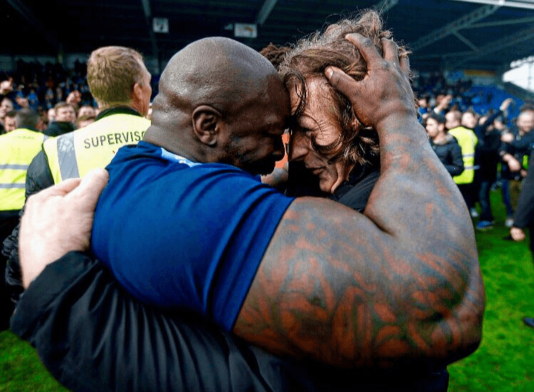 Adebayo Akinfenwa’s arms are big Adebayo Akinfenwa’s arms are big