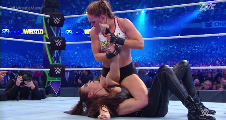 Ronda Rousey tapped out Stephanie McMahon in her first WWE match Ronda Rousey tapped out Stephanie McMahon in her first WWE match
