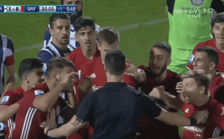 Olympiakos player pulls off dive of the year after “push” from referee Olympiakos player pulls off dive of the year after “push” from referee