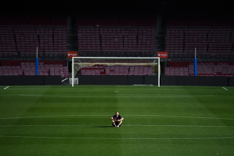 Andres Iniesta sits alone on the Camp Nou pitch until 1am following his final game for Barcelona Andres Iniesta sits alone on the Camp Nou pitch until 1am following his final game for Barcelona