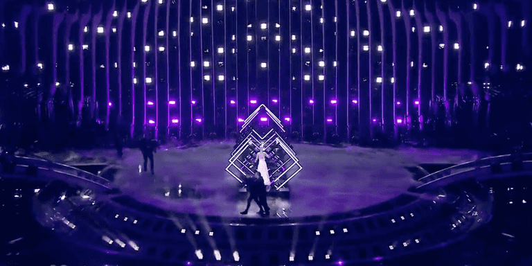 Protestor runs onstage and steals microphone during UK’s Eurovision performance Protestor runs onstage and steals microphone during UK’s Eurovision performance