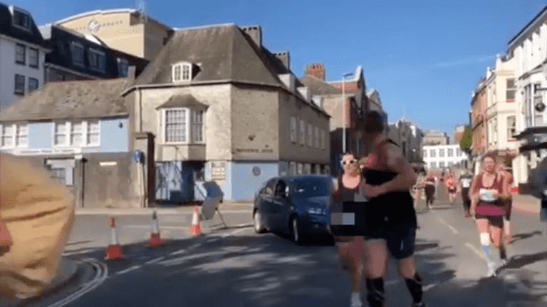 WATCH: Motorist drives into path of runners during Plymouth half marathon WATCH: Motorist drives into path of runners during Plymouth half marathon