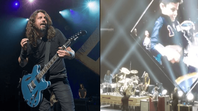 Kid refuses to leave stage after Foo Fighters invite him up to play drums Kid refuses to leave stage after Foo Fighters invite him up to play drums