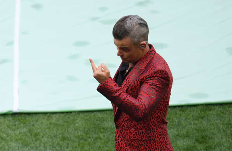 Robbie Williams explains what he meant by World Cup opening ceremony gesture Robbie Williams explains what he meant by World Cup opening ceremony gesture