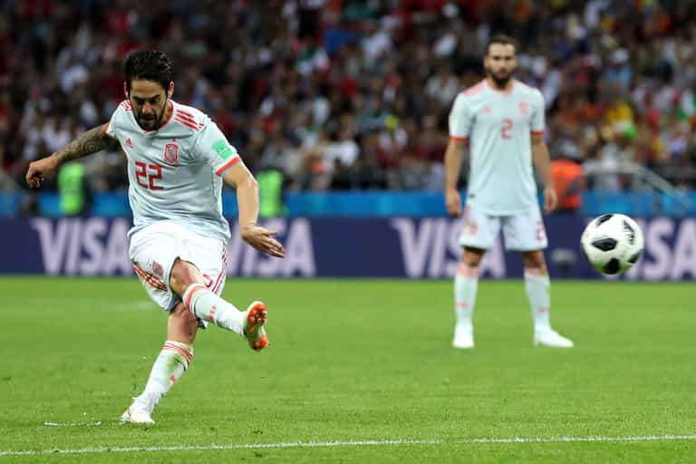 Spain star Isco comes to rescue of injured bird and escorts it off pitch during Iran game Spain star Isco comes to rescue of injured bird and escorts it off pitch during Iran game
