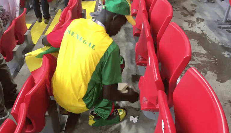 WATCH: Senegal fans spotted cleaning up after themselves after Poland victory WATCH: Senegal fans spotted cleaning up after themselves after Poland victory