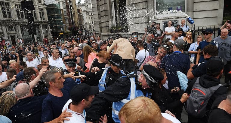 Five arrested at ‘Free Tommy Robinson’ March in London Five arrested at ‘Free Tommy Robinson’ March in London