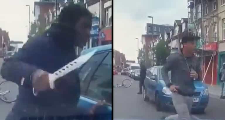 Terrifying road rage incident: Cyclist attacks car with huge zombie knife Terrifying road rage incident: Cyclist attacks car with huge zombie knife