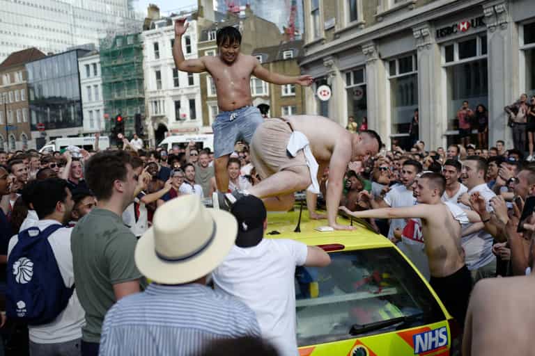 England fans smash up ambulance during wild celebrations England fans smash up ambulance during wild celebrations