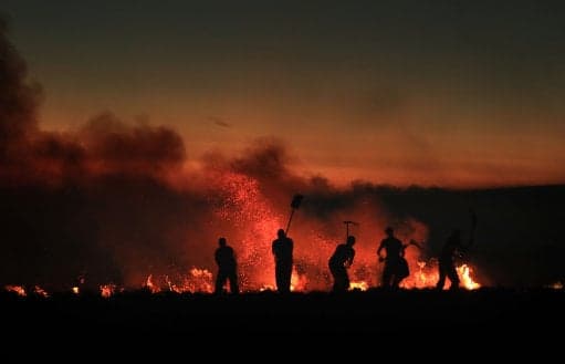 Major incident declared as two Bolton wildfires merge Major incident declared as two Bolton wildfires merge