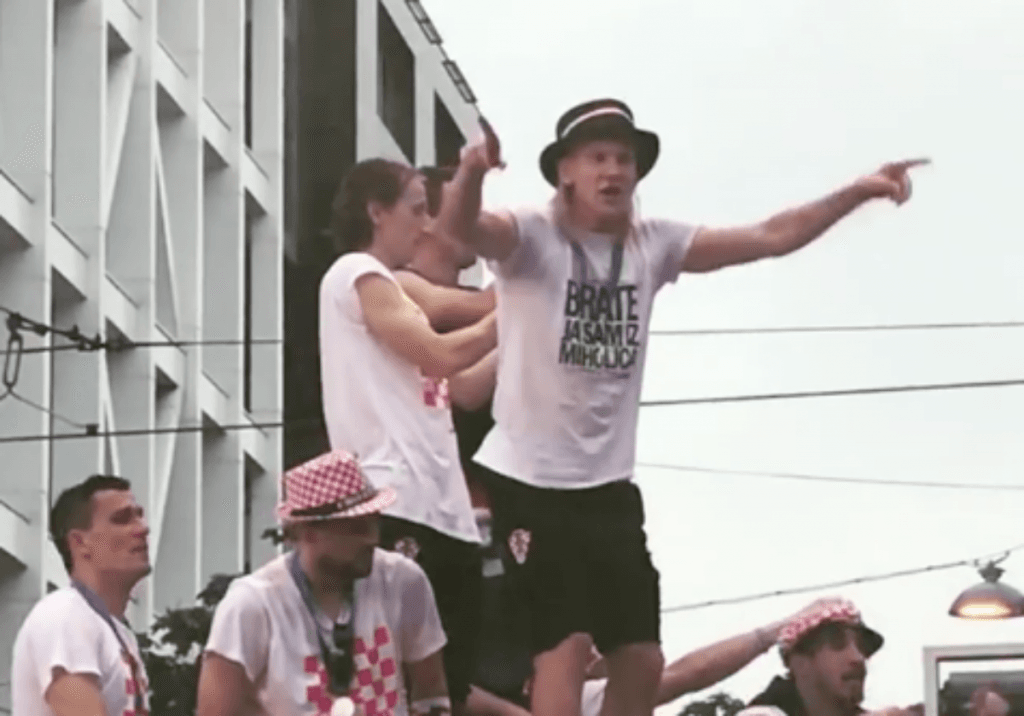 WATCH: Croatia goalkeeper prevents teammate from falling off bus rooftop
