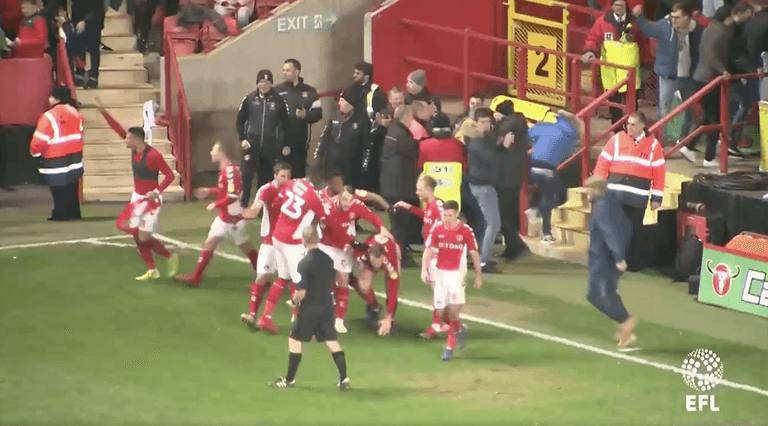 Charlton fan crunches own player during wild goal celebrations Charlton fan crunches own player during wild goal celebrations
