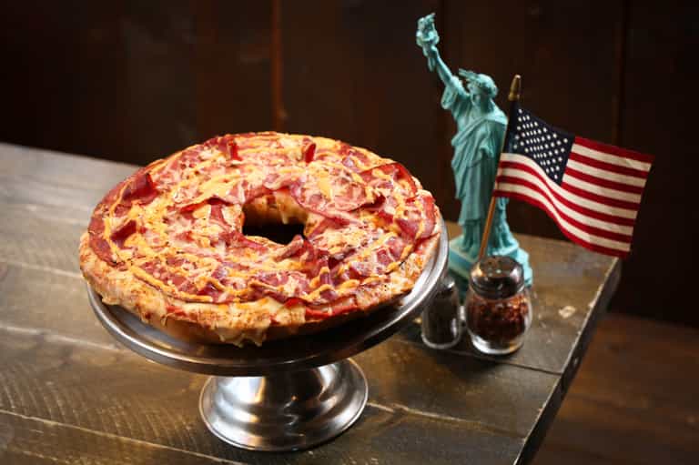 Giant bagels combined with pizza are now a thing you can buy in the UK Giant bagels combined with pizza are now a thing you can buy in the UK
