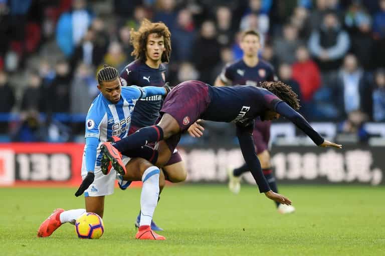 Arsenal subs duck down so supporters can watch Aubameyang penalty Arsenal subs duck down so supporters can watch Aubameyang penalty