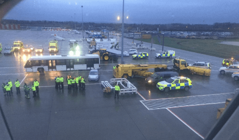 Passengers quarantined by masked staff after ‘coughing sickness’ outbreak on flight to Gatwick Passengers quarantined by masked staff after ‘coughing sickness’ outbreak on flight to Gatwick