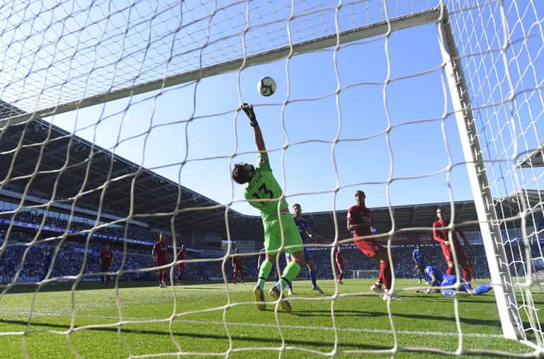Alisson shows reflexes of a cat with save during Liverpool warm-up Alisson shows reflexes of a cat with save during Liverpool warm-up