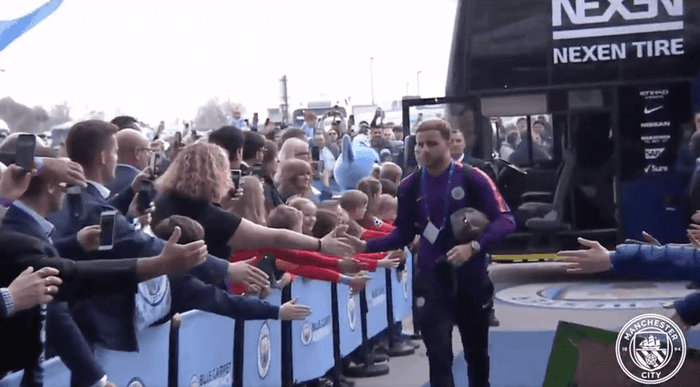 Ridiculous scenes as Manchester City players have over-the-top walking off the bus announcer Ridiculous scenes as Manchester City players have over-the-top walking off the bus announcer