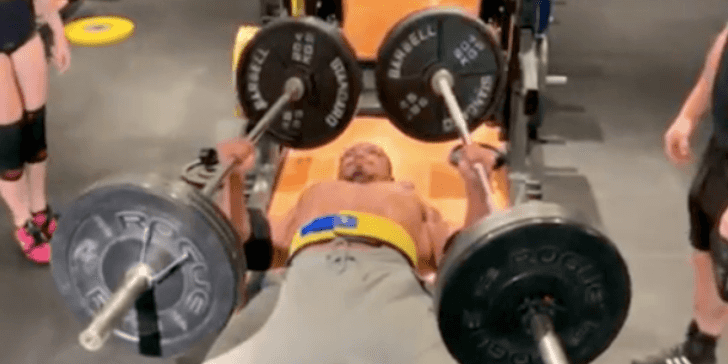 Powerlifter Larry Wheels bench presses with a staggering 110kg barbell in each hand Powerlifter Larry Wheels bench presses with a staggering 110kg barbell in each hand