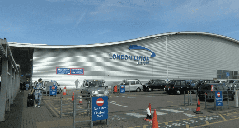 Four men detained on terrorism charges at Luton airport Four men detained on terrorism charges at Luton airport