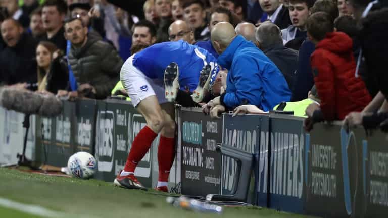Sunderland player involved in pitchside altercation with Portsmouth supporters Sunderland player involved in pitchside altercation with Portsmouth supporters
