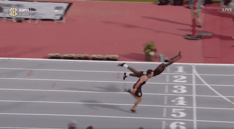 College athlete risks it all with superman dive to win 400m hurdles College athlete risks it all with superman dive to win 400m hurdles