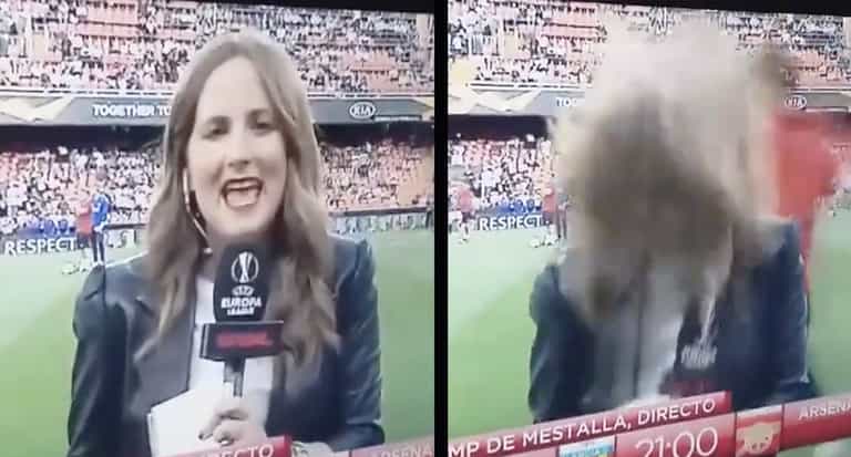 Reporter hit by ball as Arsenal players warm-up in Valencia Reporter hit by ball as Arsenal players warm-up in Valencia
