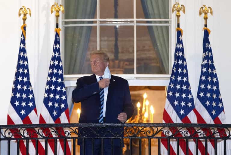 Covid-infected Donald Trump removes mask before bizarre White House statement Covid-infected Donald Trump removes mask before bizarre White House statement