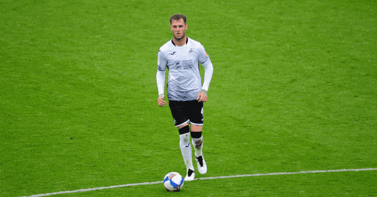 Tottenham set to land Wales and Swansea centre-back in £18 million deal Tottenham set to land Wales and Swansea centre-back in £18 million deal