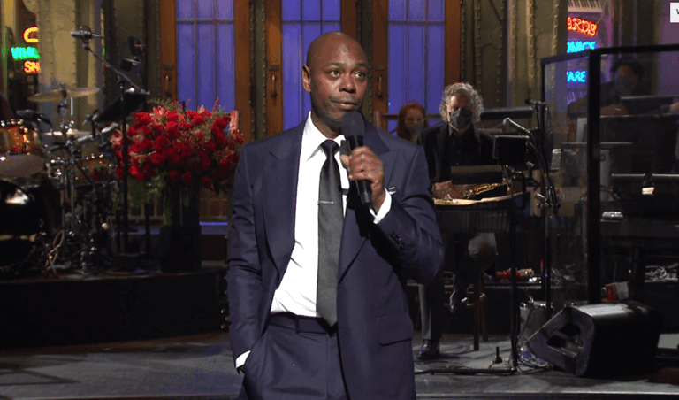 Dave Chappelle refers to Trump as a ‘hilarious racist’ in SNL monologue Dave Chappelle refers to Trump as a ‘hilarious racist’ in SNL monologue