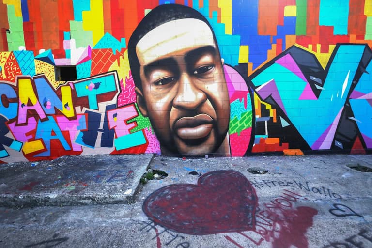 A George Floyd mural in Houston has been defaced with racial epiphets A George Floyd mural in Houston has been defaced with racial epiphets