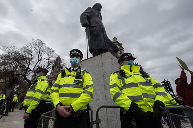 Police ridiculed for guarding Churchill statue at Kill the Bill protest Police ridiculed for guarding Churchill statue at Kill the Bill protest