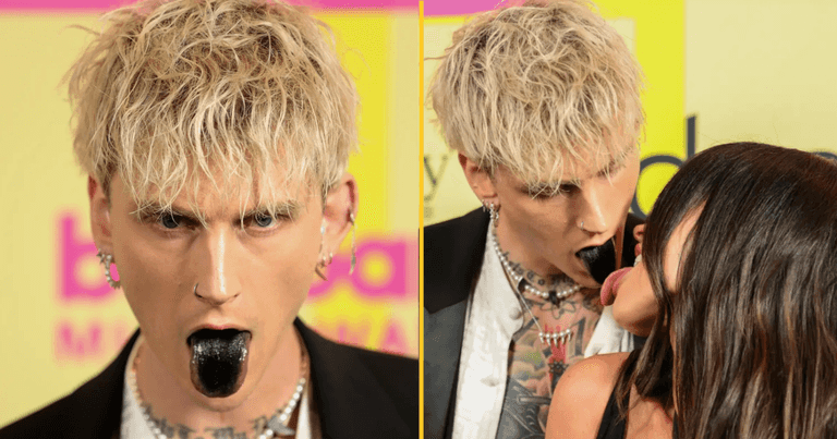 Machine Gun Kelly has painted his tongue black Machine Gun Kelly has painted his tongue black